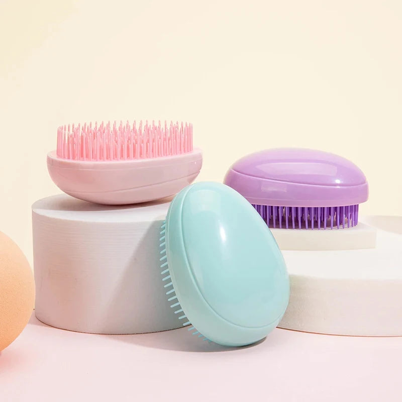 Mini brosse à cheveux démêlante Oeuf Brosses à cheveux en forme ronde Peignes à lisser les cheveux anti-nouage Massage antistatique Outils de soins capillaires
